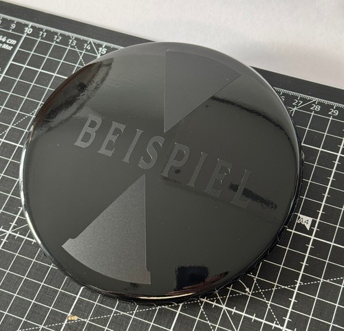 Film set front emblem - front, black